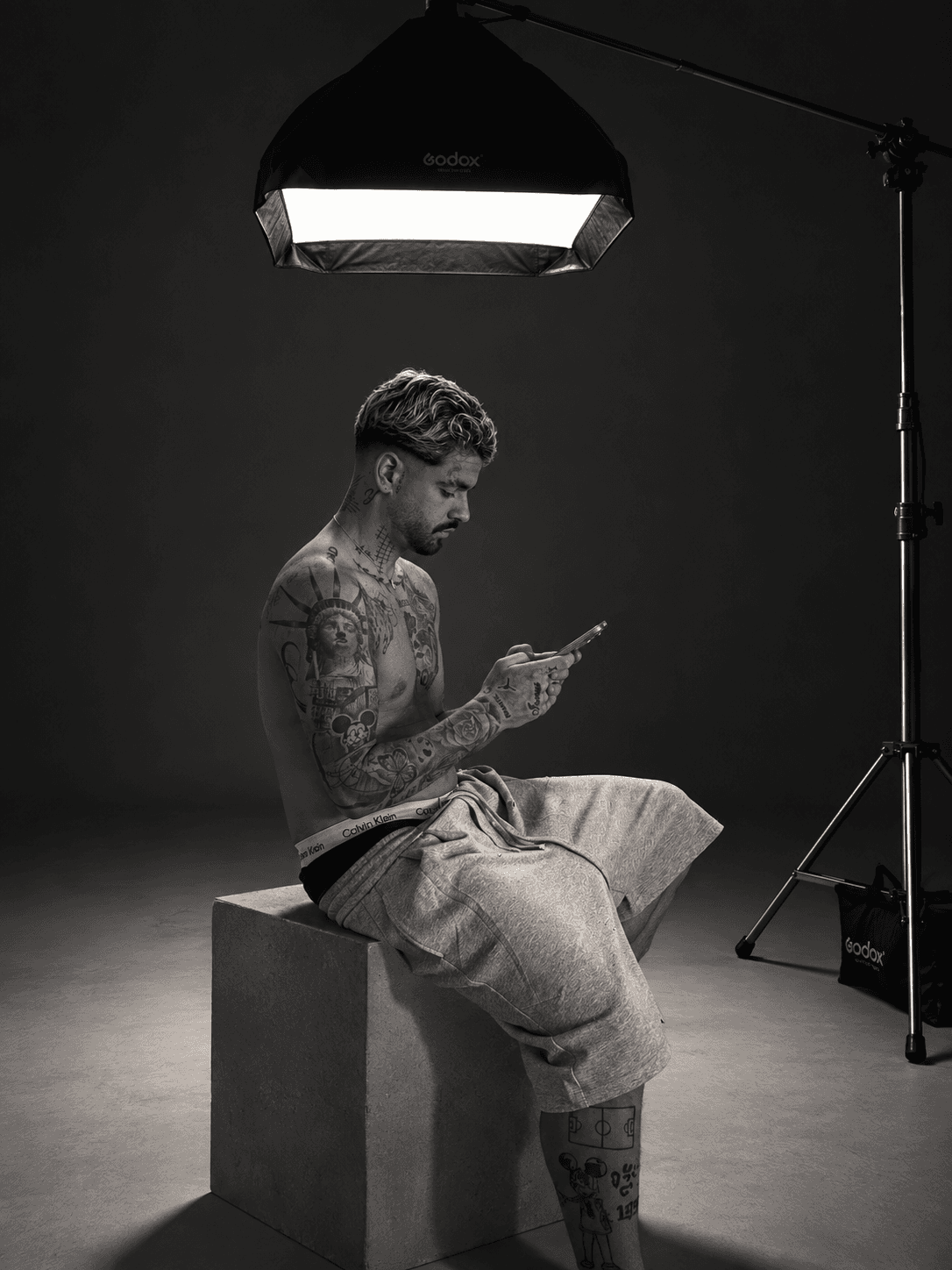 ORS LABEL look — behind-the-scenes studio shot in grey sweatpants